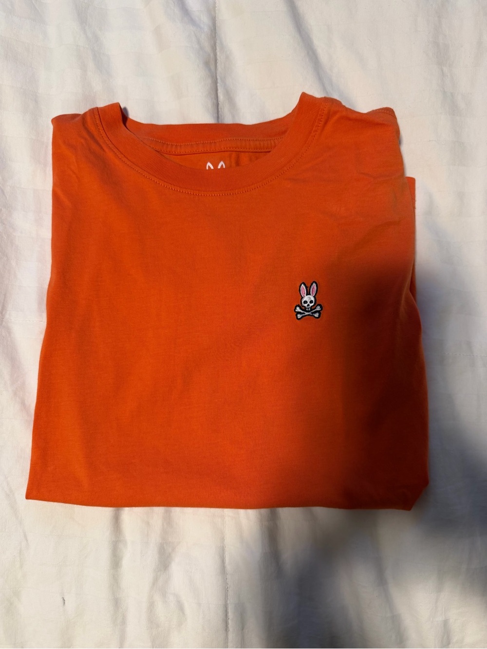 Psycho Bunny Orange Short Sleeve Crewneck Tee with Embroidered Bunny Skull